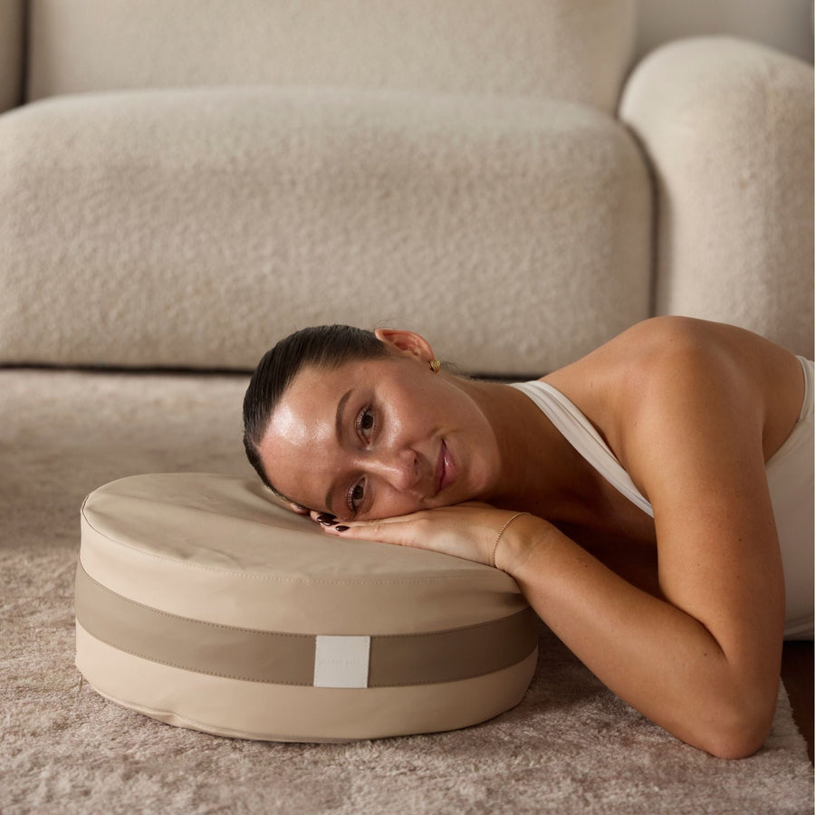 Woman meditating on Maison Snail buckwheat zafu cushion — daily ritual and mindfulness practice Melbourne Australia